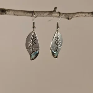 tree with turquoise dangle earrings
