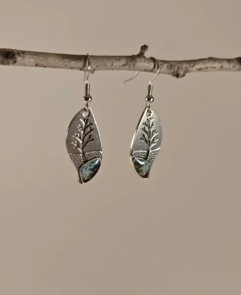 tree with turquoise dangle earrings