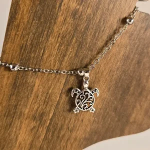 dangling sea turtle anklet