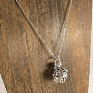 hollow flower-carved urn