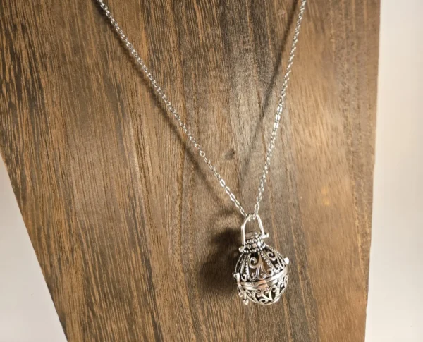 hollow flower-carved urn